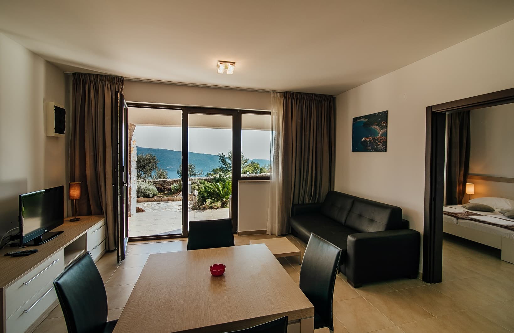 Furnished One-Bedroom Apartment with Spacious Terrace in Podi 4